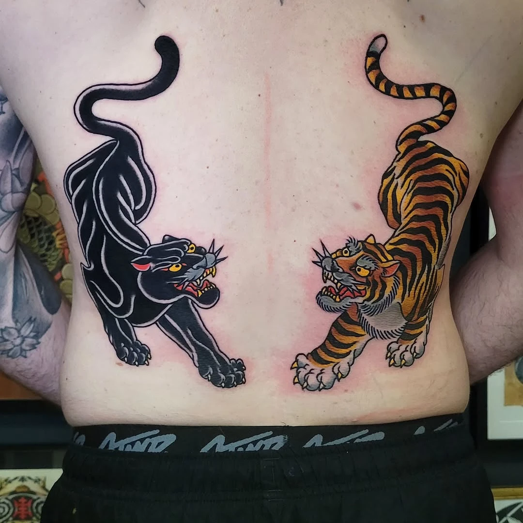 Made at @halfwolftattoo , thank you Jonas for your trust again ! #panthertattoo #tigertattoo #traditionaltattoo #oldschooltattoo #tiger
