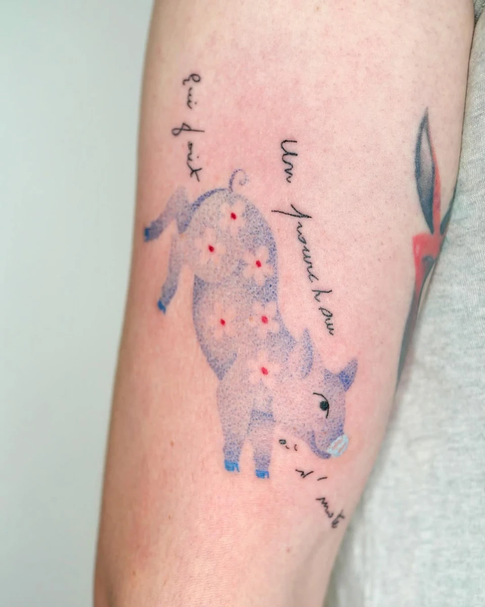 Un petit cochon bleu pour Sylvain, avec une phrase de sa grand-mère.